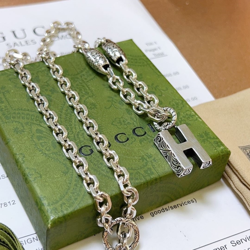 G*u*i necklaces